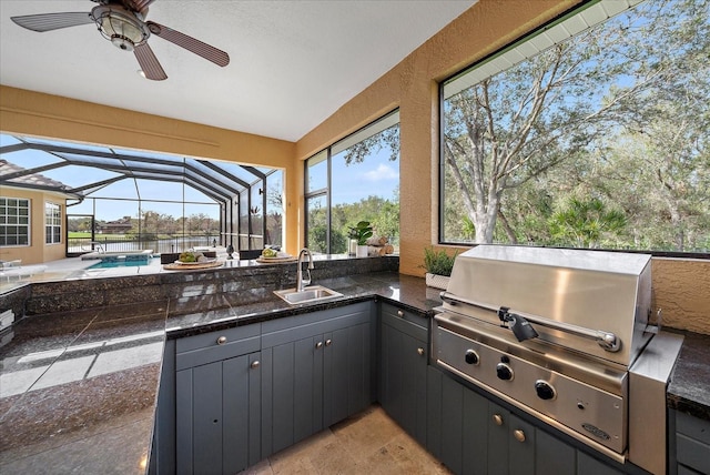 view of patio / terrace with glass enclosure, grilling area, sink, ceiling fan, and a pool