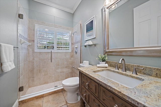 bathroom featuring an enclosed shower, vanity, toilet, and crown molding