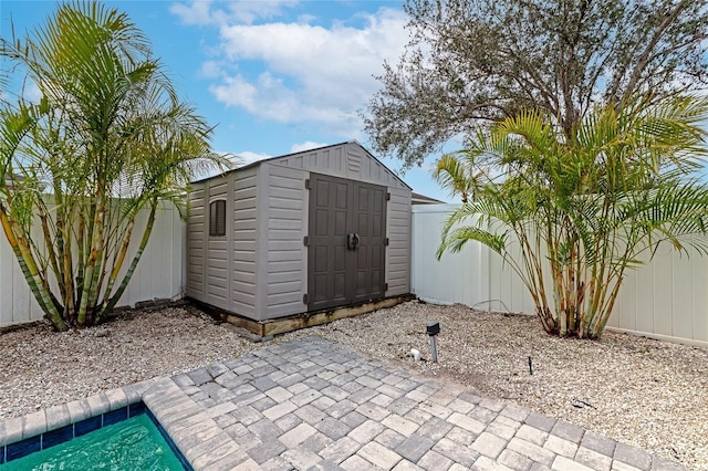 view of outdoor structure featuring a pool