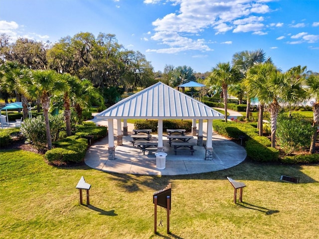 view of home's community with a gazebo and a yard