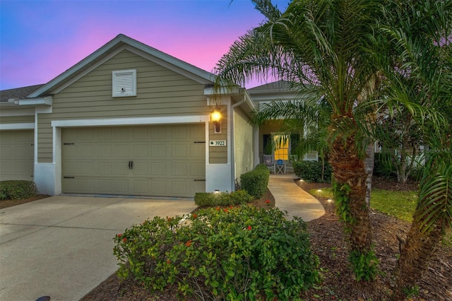 single story home with a garage