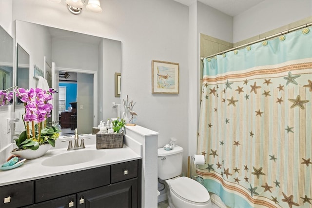 3922 Wildgrass Pl, Parrish, FL 34219 - bathroom featuring vanity, toilet, and a shower with shower curtain