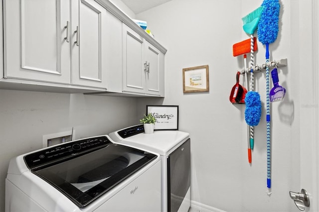 3922 Wildgrass Pl, Parrish, FL 34219 - washroom featuring washer and dryer, cabinet space, and baseboards