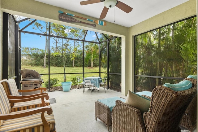 3922 Wildgrass Pl, Parrish, FL 34219 - sunroom / solarium featuring a ceiling fan