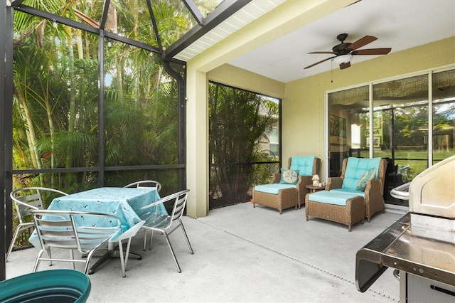 3922 Wildgrass Pl, Parrish, FL 34219 - sunroom / solarium featuring a ceiling fan and outdoor dining area