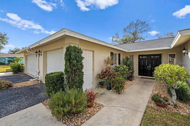 entrance to property featuring a garage