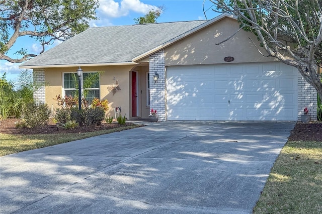 single story home with a garage