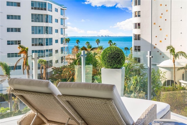 balcony featuring a water view