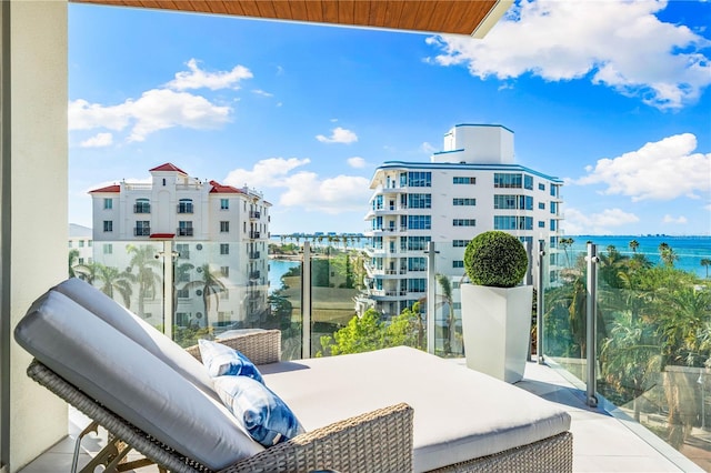 balcony featuring a water view