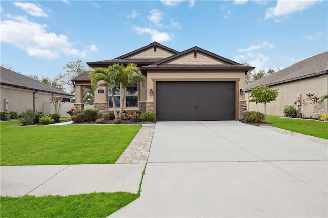 view of front of house with a front yard and a garage