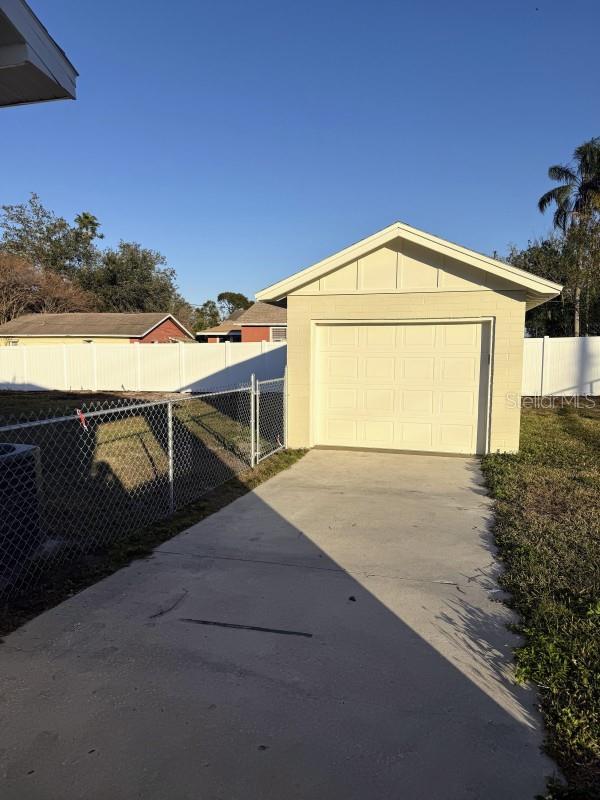 garage with central air condition unit