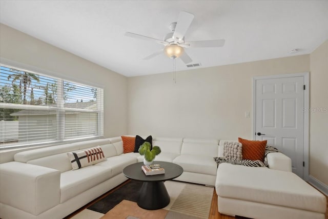 living room featuring ceiling fan