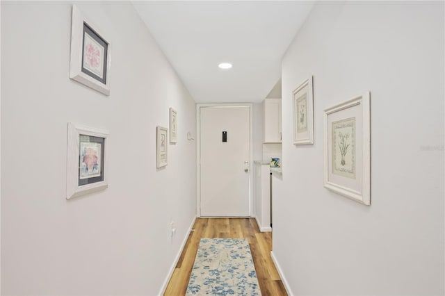 hall featuring light hardwood / wood-style floors