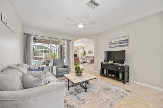 living room featuring ceiling fan