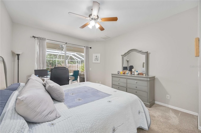 carpeted bedroom featuring access to exterior and ceiling fan