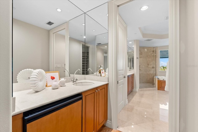 bathroom with vanity and walk in shower