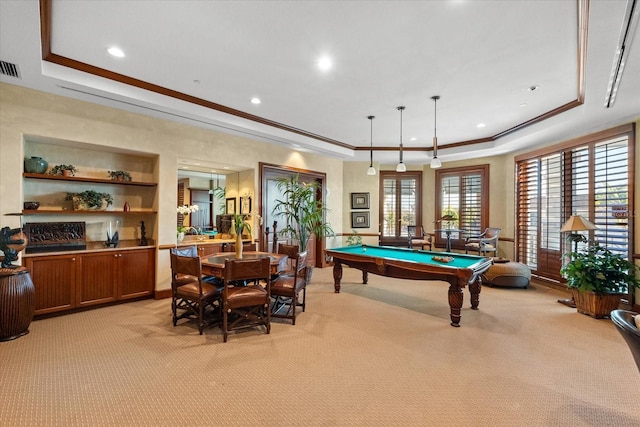 game room featuring a raised ceiling, crown molding, light colored carpet, and pool table