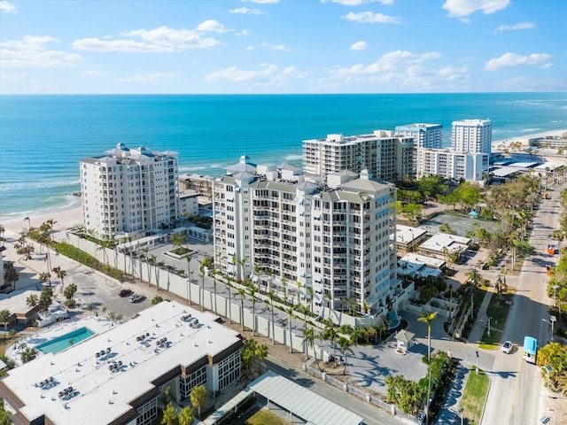 aerial view with a view of the beach and a water view