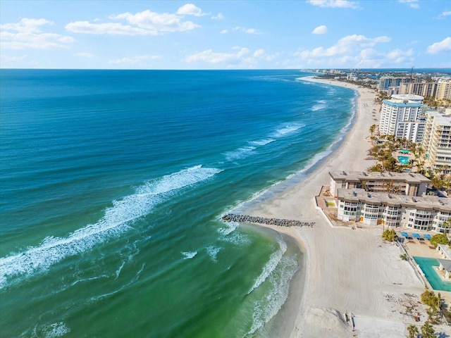 aerial view featuring a water view and a view of the beach