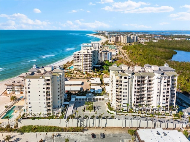 aerial view featuring a water view and a view of the beach