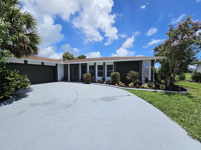 single story home with a front yard