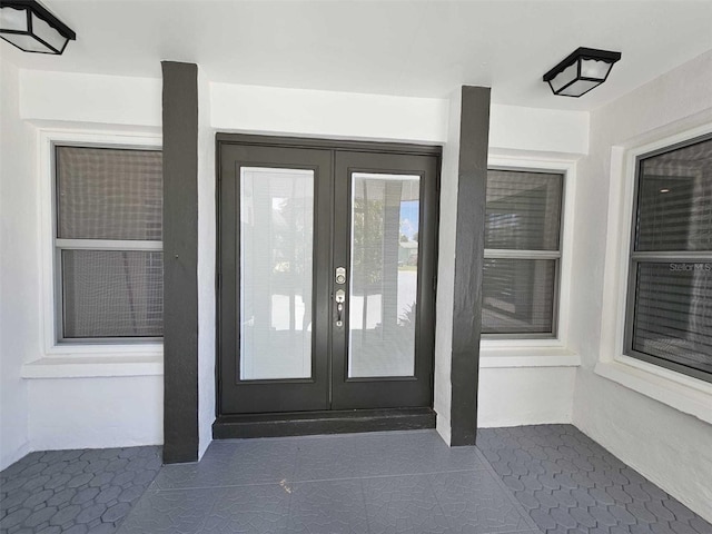 doorway to property featuring french doors