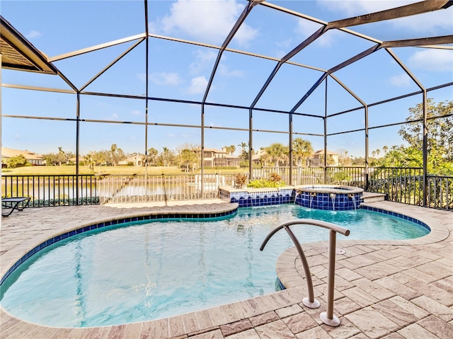 view of swimming pool with pool water feature, an in ground hot tub, a water view, a patio, and glass enclosure