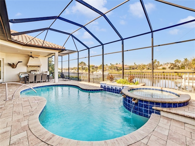 view of pool with a patio, a pool with connected hot tub, a water view, fence, and a lanai