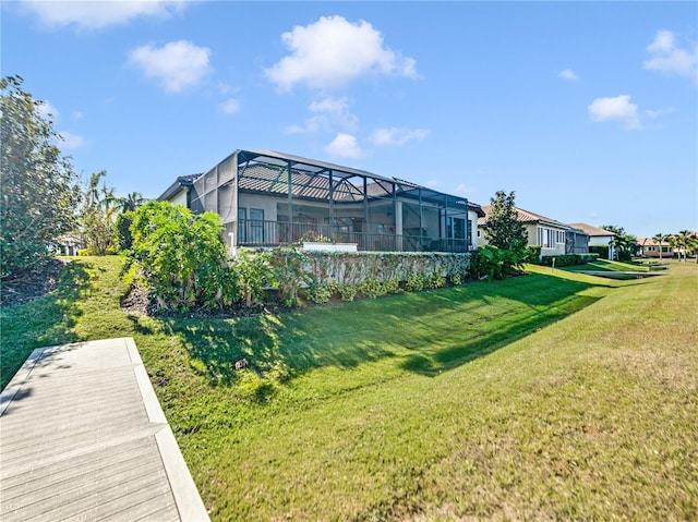 view of yard featuring a lanai