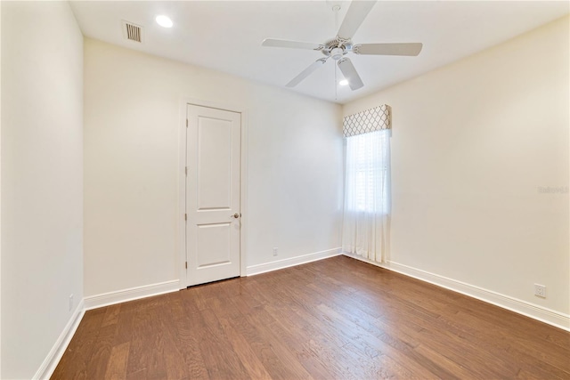 spare room featuring baseboards, visible vents, ceiling fan, wood finished floors, and recessed lighting