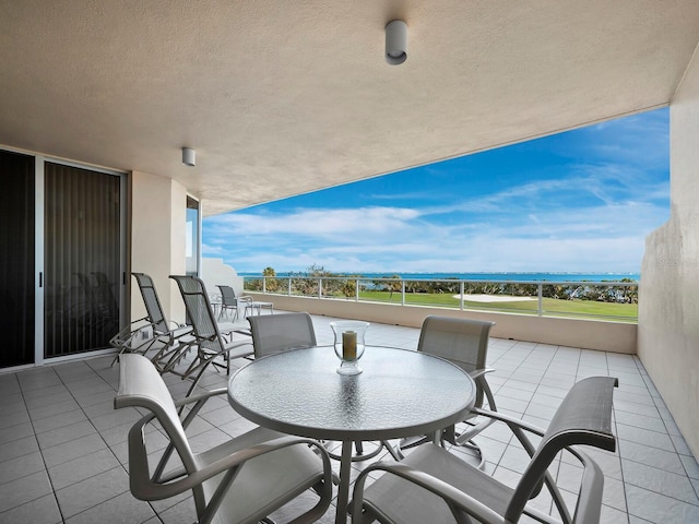 balcony featuring outdoor dining area