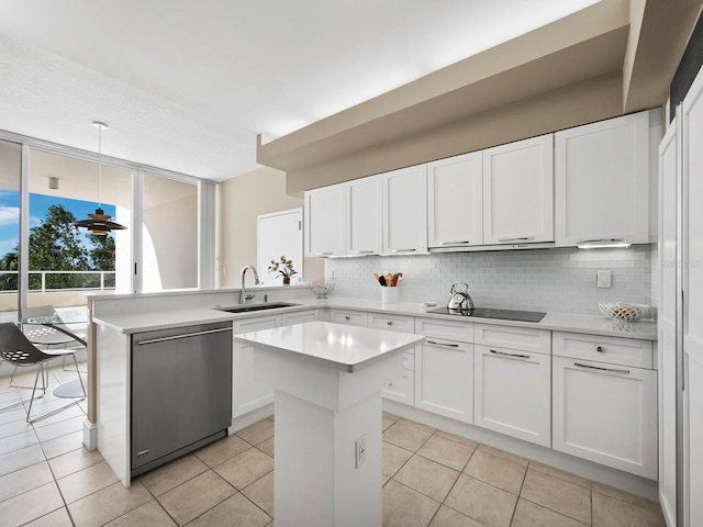 kitchen with dishwasher, a sink, black electric cooktop, and decorative backsplash