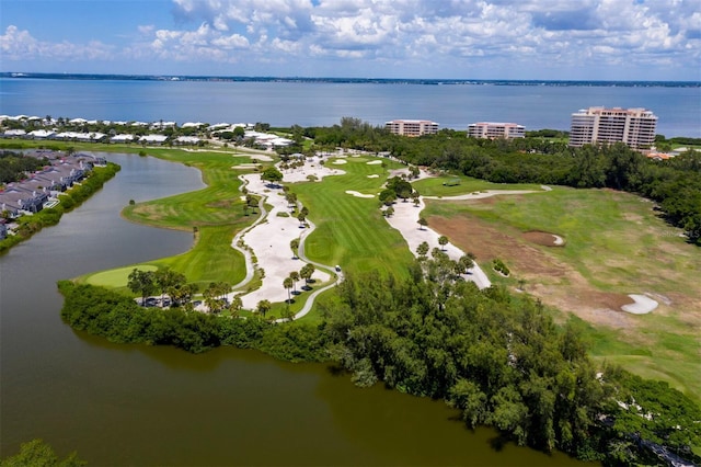 aerial view with view of golf course and a water view