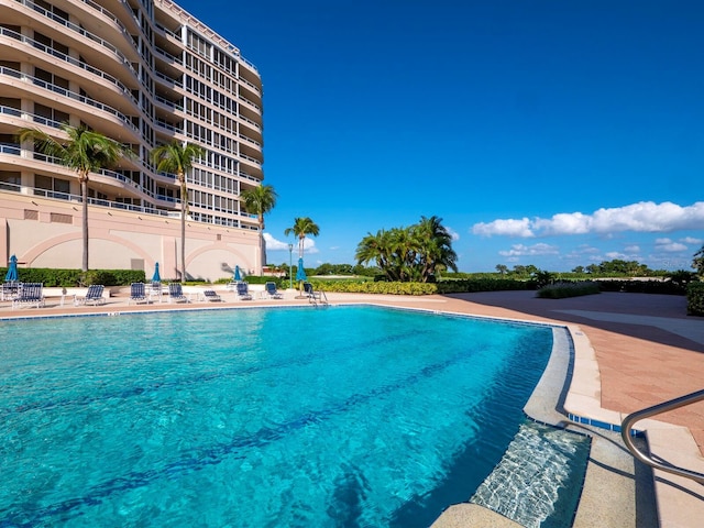 community pool with a patio