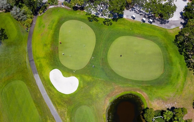 birds eye view of property featuring golf course view