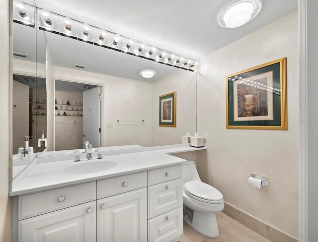 bathroom featuring toilet, tile patterned flooring, visible vents, and vanity