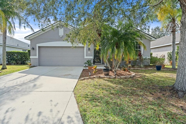 single story home with a front yard and a garage