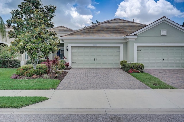 ranch-style home with a garage