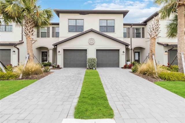 view of front of property with a garage