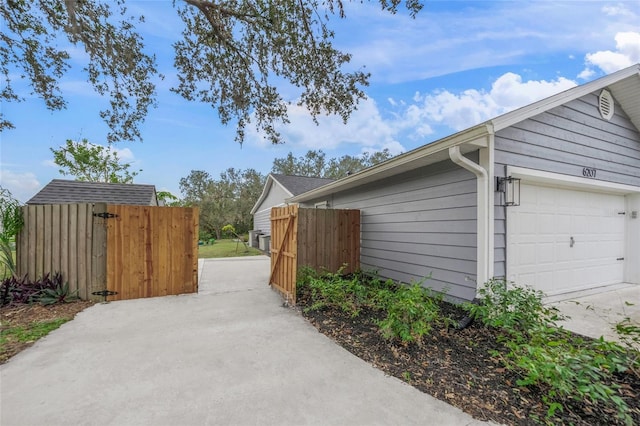 view of side of property featuring a garage