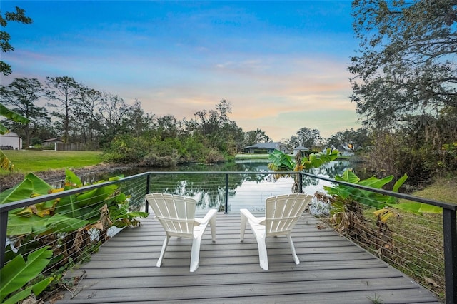 deck at dusk with a water view