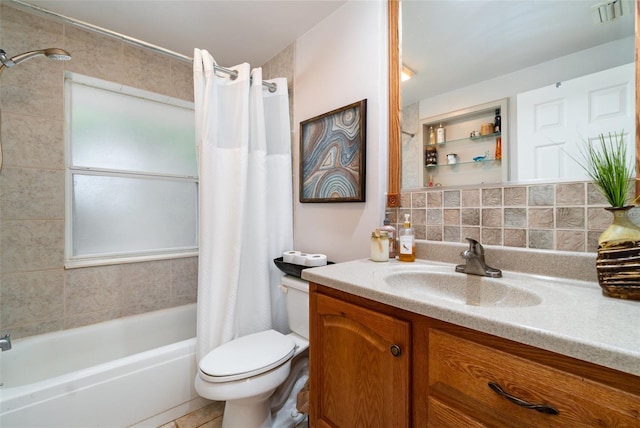 full bathroom with toilet, decorative backsplash, shower / bath combo, tile patterned flooring, and vanity