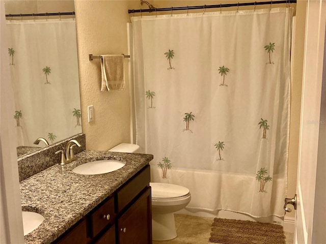 full bathroom featuring tile patterned flooring, vanity, shower / bath combination with curtain, and toilet