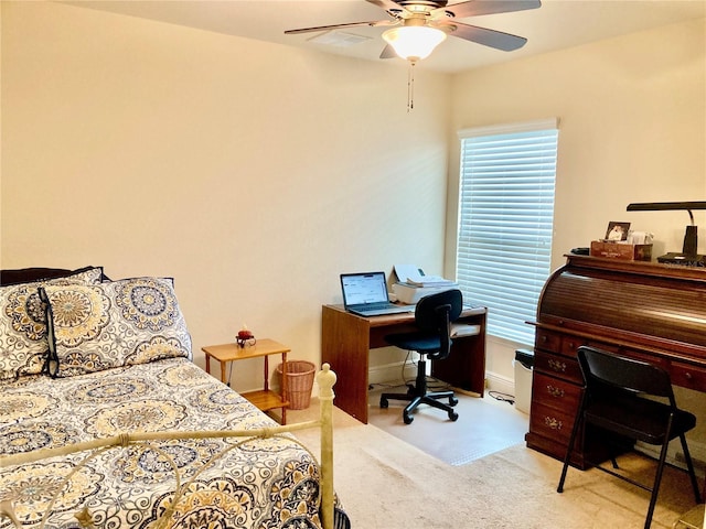 bedroom with light colored carpet and ceiling fan