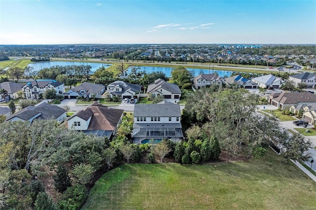 aerial view featuring a residential view and a water view