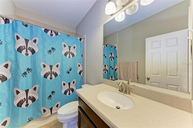 full bath with a shower with shower curtain, toilet, vanity, and a textured ceiling