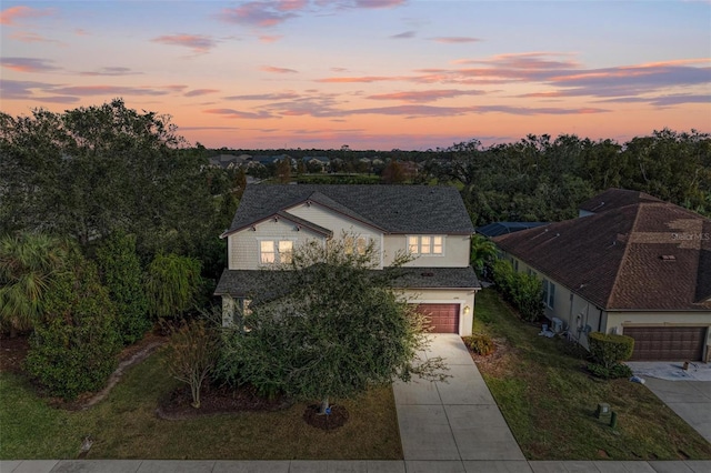 view of aerial view at dusk