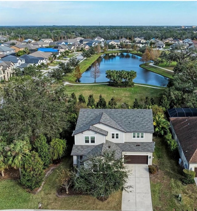 aerial view featuring a residential view and a water view