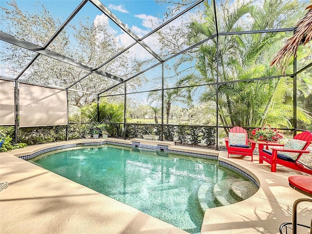 pool featuring a patio area and a lanai