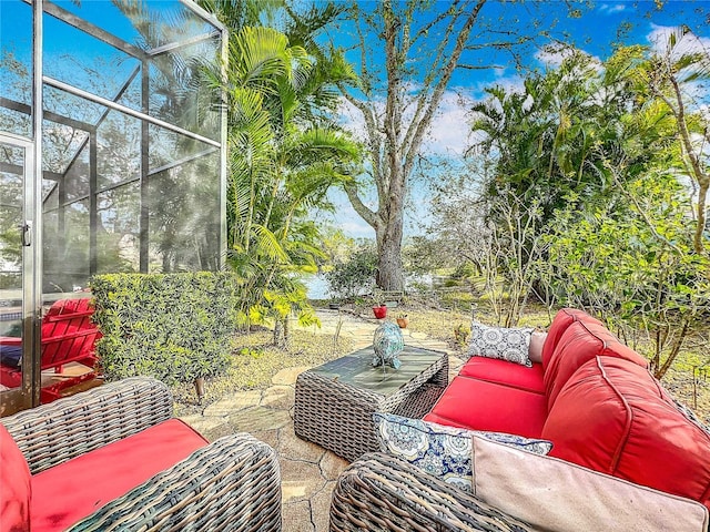 view of patio with a lanai and an outdoor living space